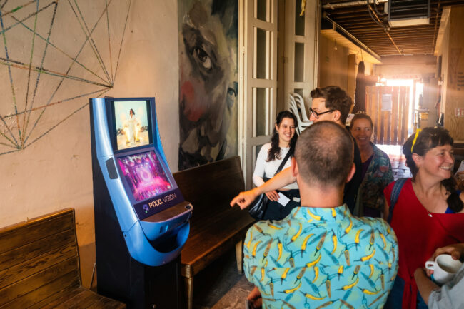 Visitors queueing for some AI theater magic